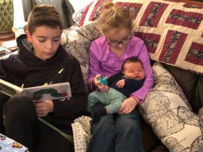 We love reading to our new baby brother!